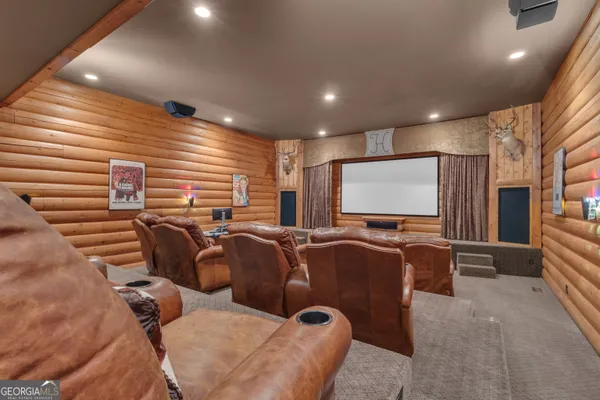 a view of a room with wooden walls