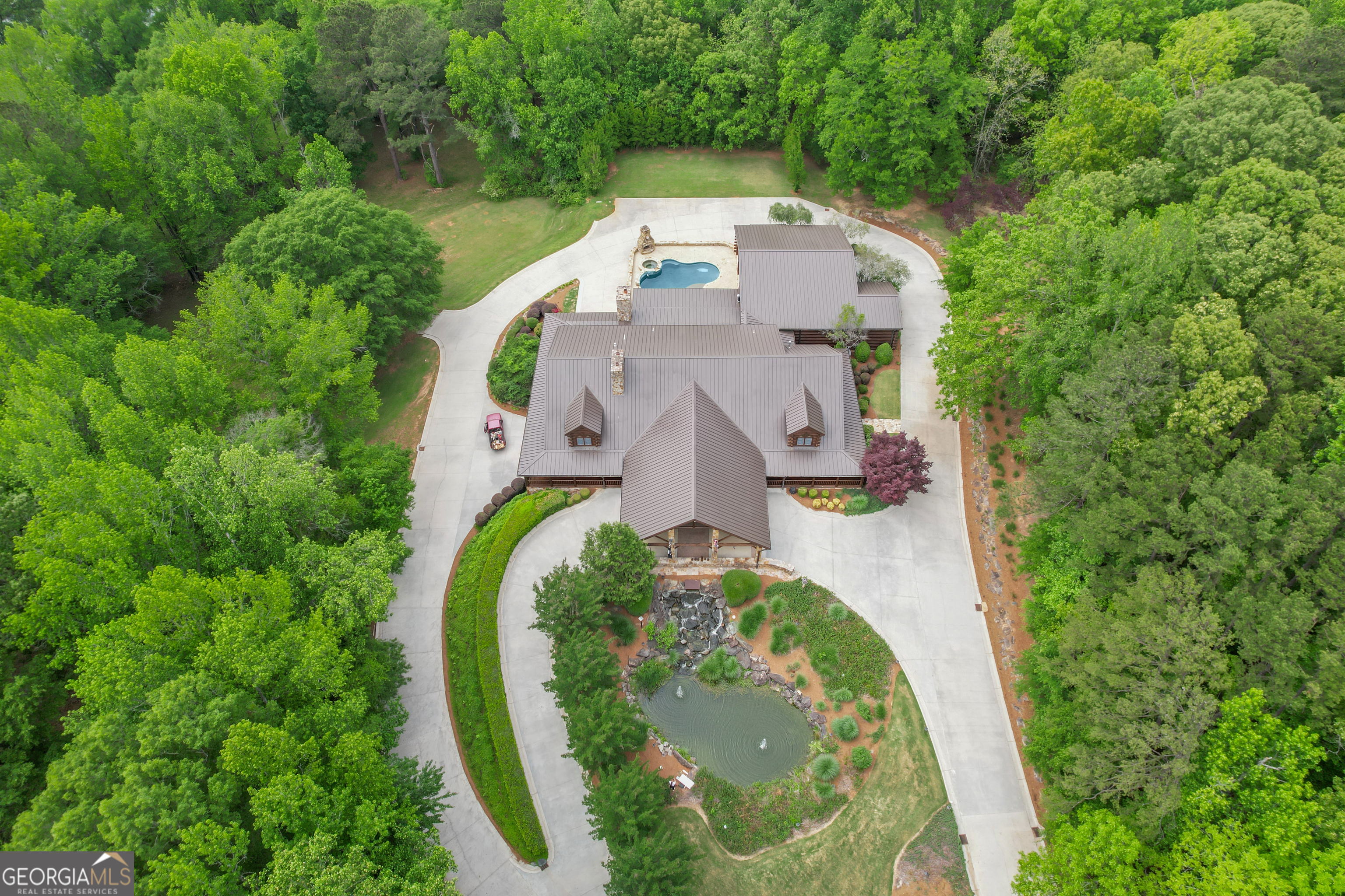 14501 Woolsey Road Hampton, GA 30228 - Photo 10 of 142 an aerial view of a house with outdoor space and trees all around