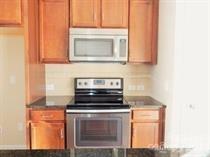 5204 Prosperity Church Road Charlotte, NC 28269 - Photo 4 of 8 a stove top oven sitting inside of a kitchen