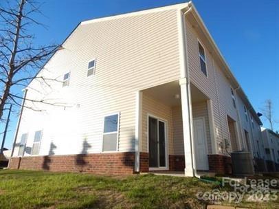 5204 Prosperity Church Road Charlotte, NC 28269 - Photo 8 of 8 a view of house with backyard