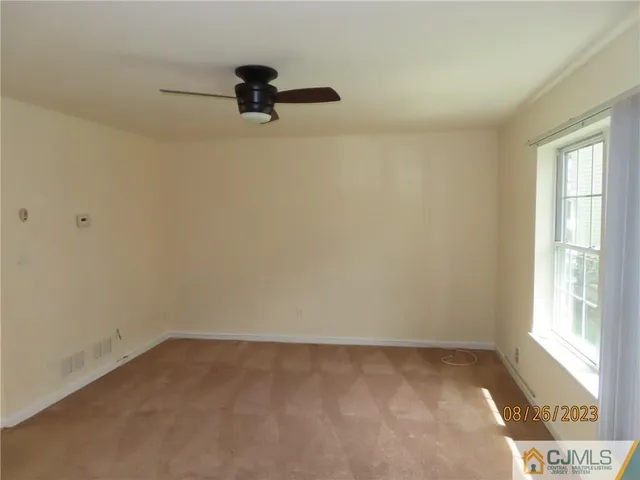 a view of a room with a window