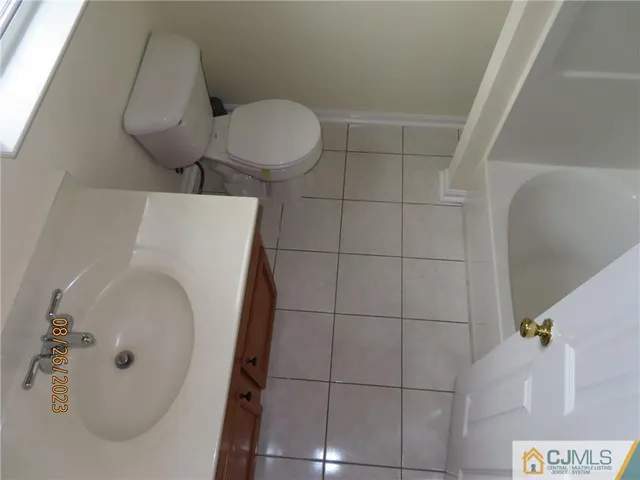 a bathroom with a sink and toilet