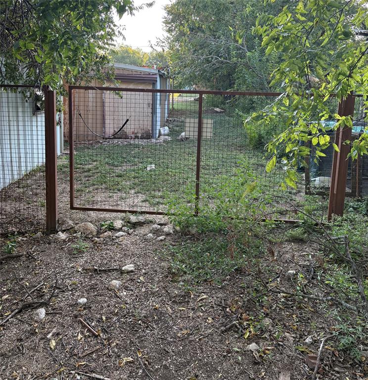407 North Lane Street Decatur, TX 76234 - Photo 19 of 19 a view of a backyard