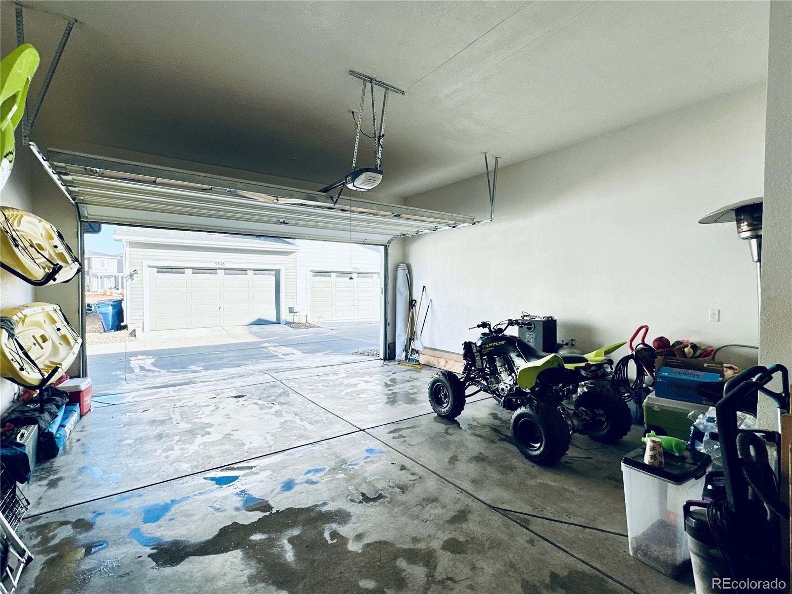 5337 Warrior Street Frederick, CO 80504 - Photo 16 of 17 a view of a garage with stuff