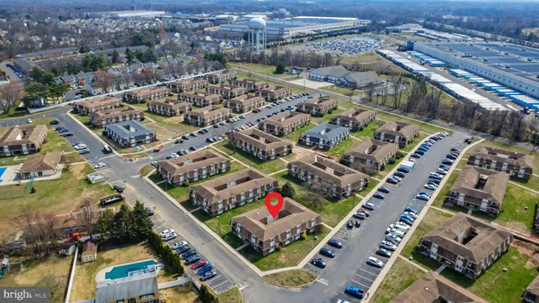 a view of a house with a backyard porch and sitting area