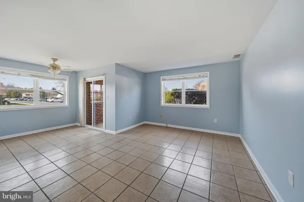 an empty room with windows