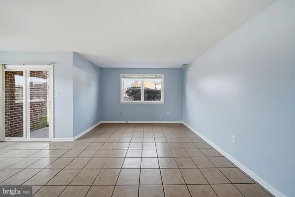 a kitchen with stainless steel appliances granite countertop a refrigerator sink and cabinets