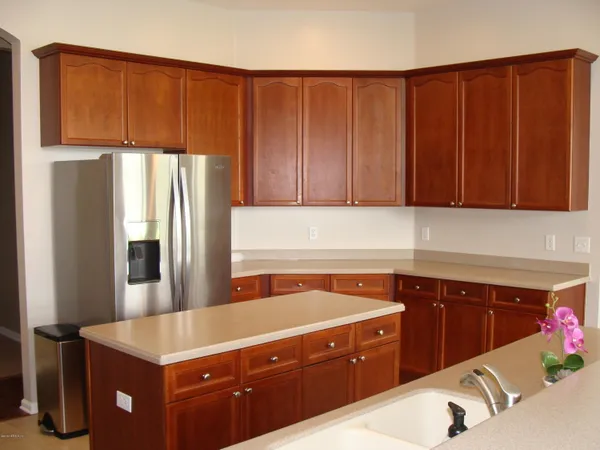 a kitchen with a sink and a window