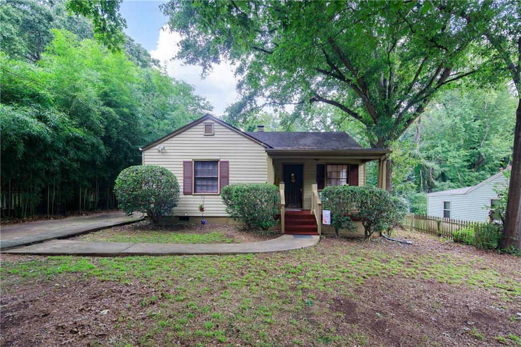 3486 Orchard Circle Decatur, GA 30032 - Photo 1 of 1 a view of a house with yard and a garden
