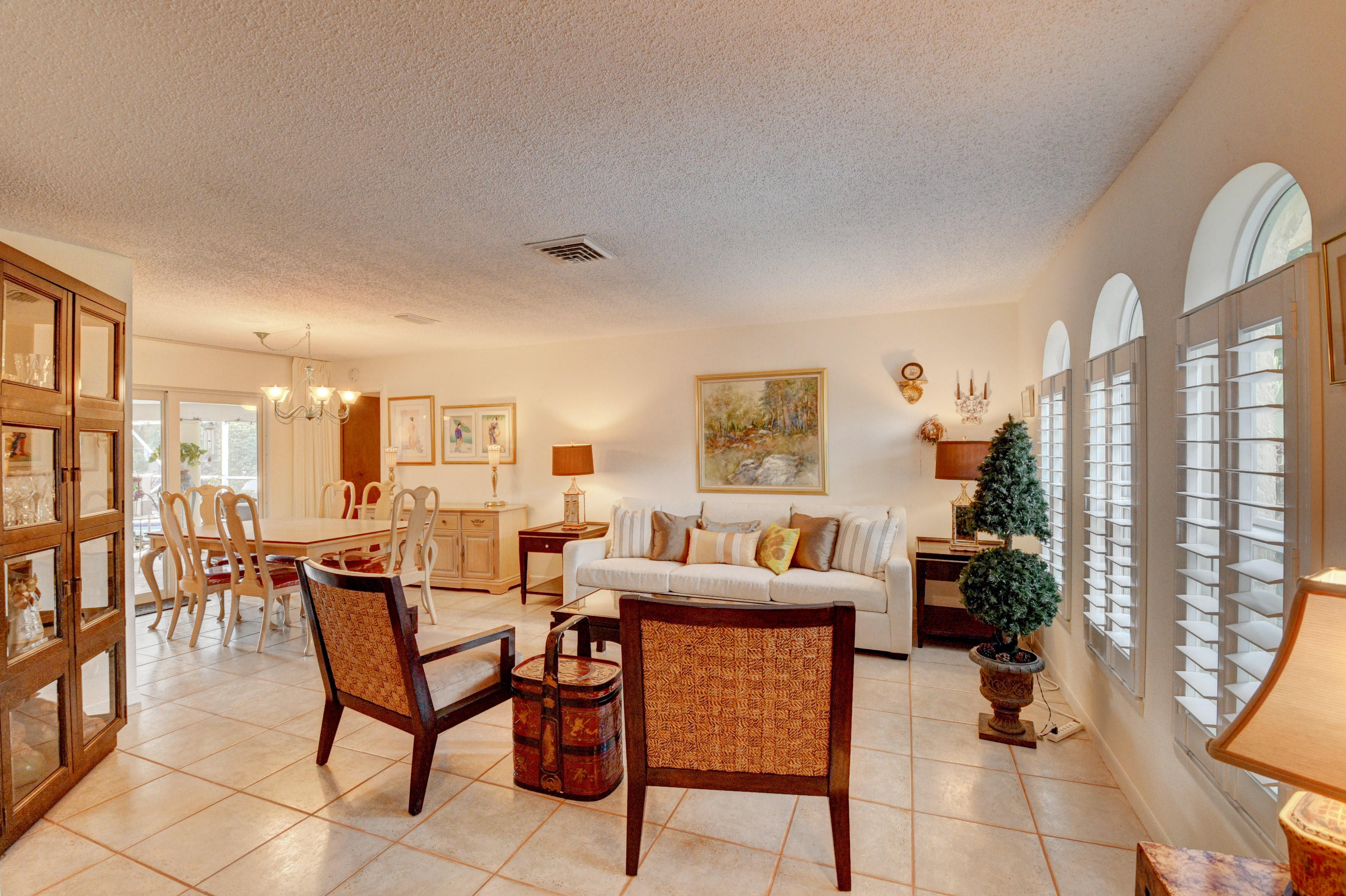 980 Southwest 21st Lane Boca Raton, FL 33486 - Photo 5 of 49 Living Room with Plantation Shutters