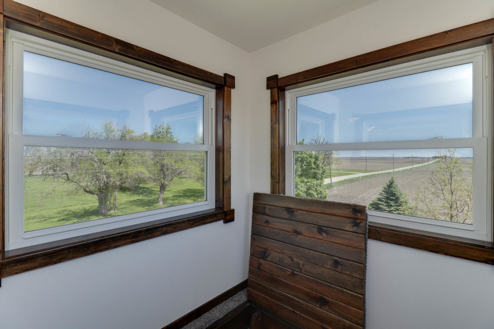 12014 Prairie Center Road Clinton, IL 61727 - Photo 19 of 56 a view of a two chair in the window
