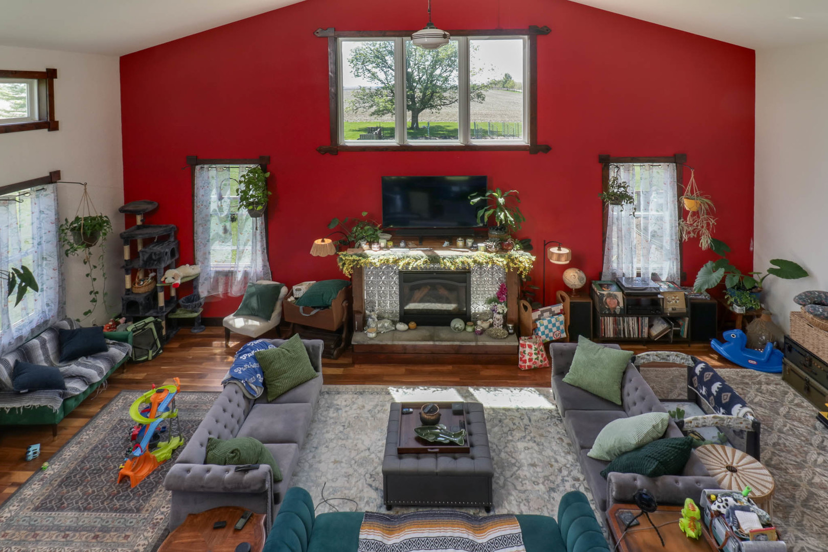 12014 Prairie Center Road Clinton, IL 61727 - Photo 2 of 56 a living room with furniture and a fireplace