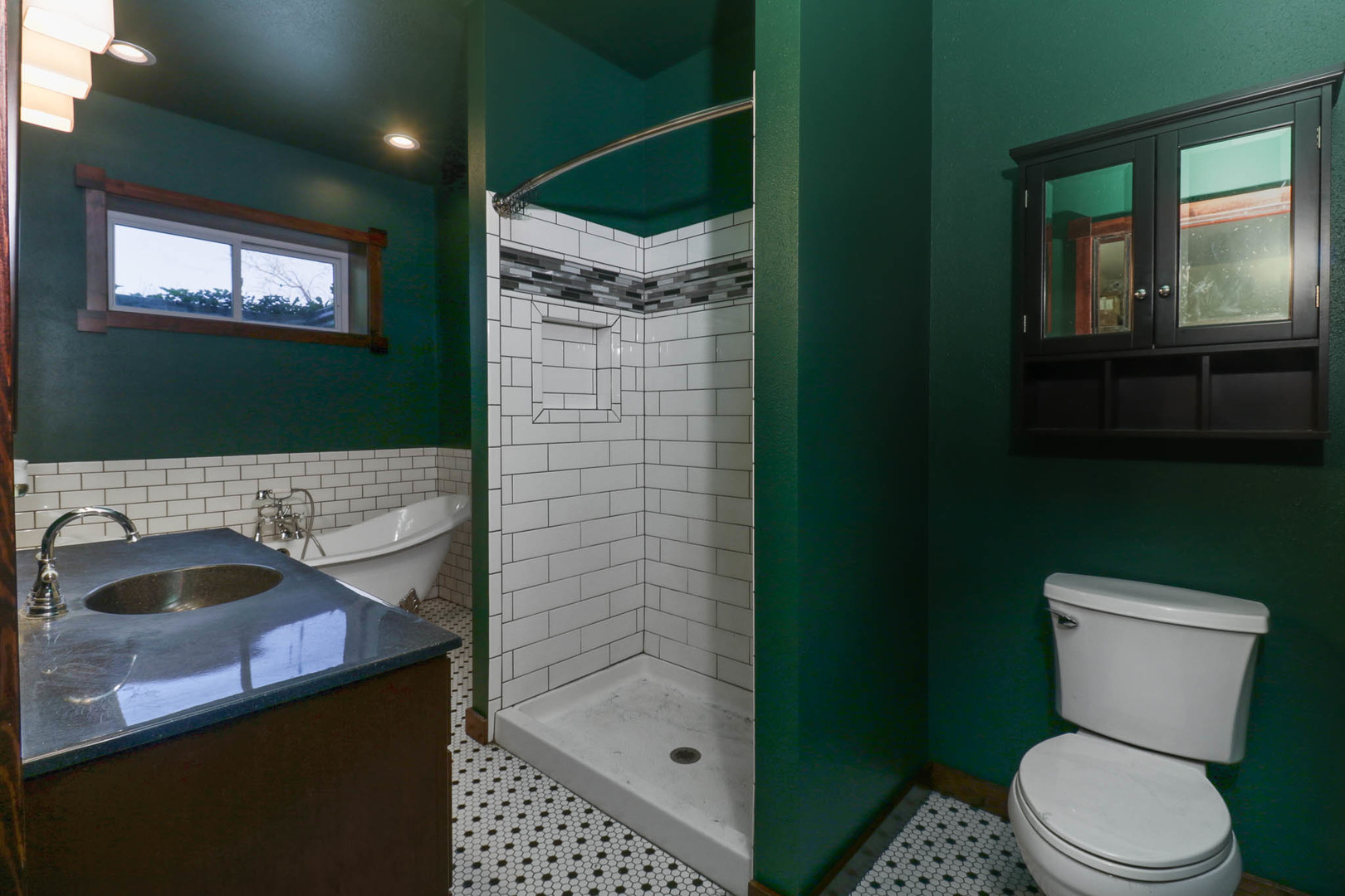 12014 Prairie Center Road Clinton, IL 61727 - Photo 26 of 56 a bathroom with a sink a toilet and shower