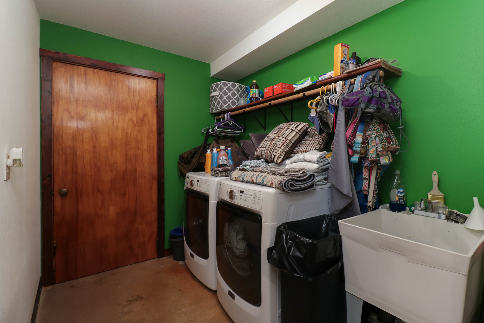 12014 Prairie Center Road Clinton, IL 61727 - Photo 34 of 56 a view of walk in closet with clothes and shoes