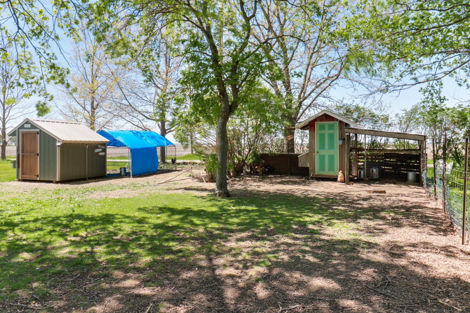 12014 Prairie Center Road Clinton, IL 61727 - Photo 45 of 56 a view of a house with a yard