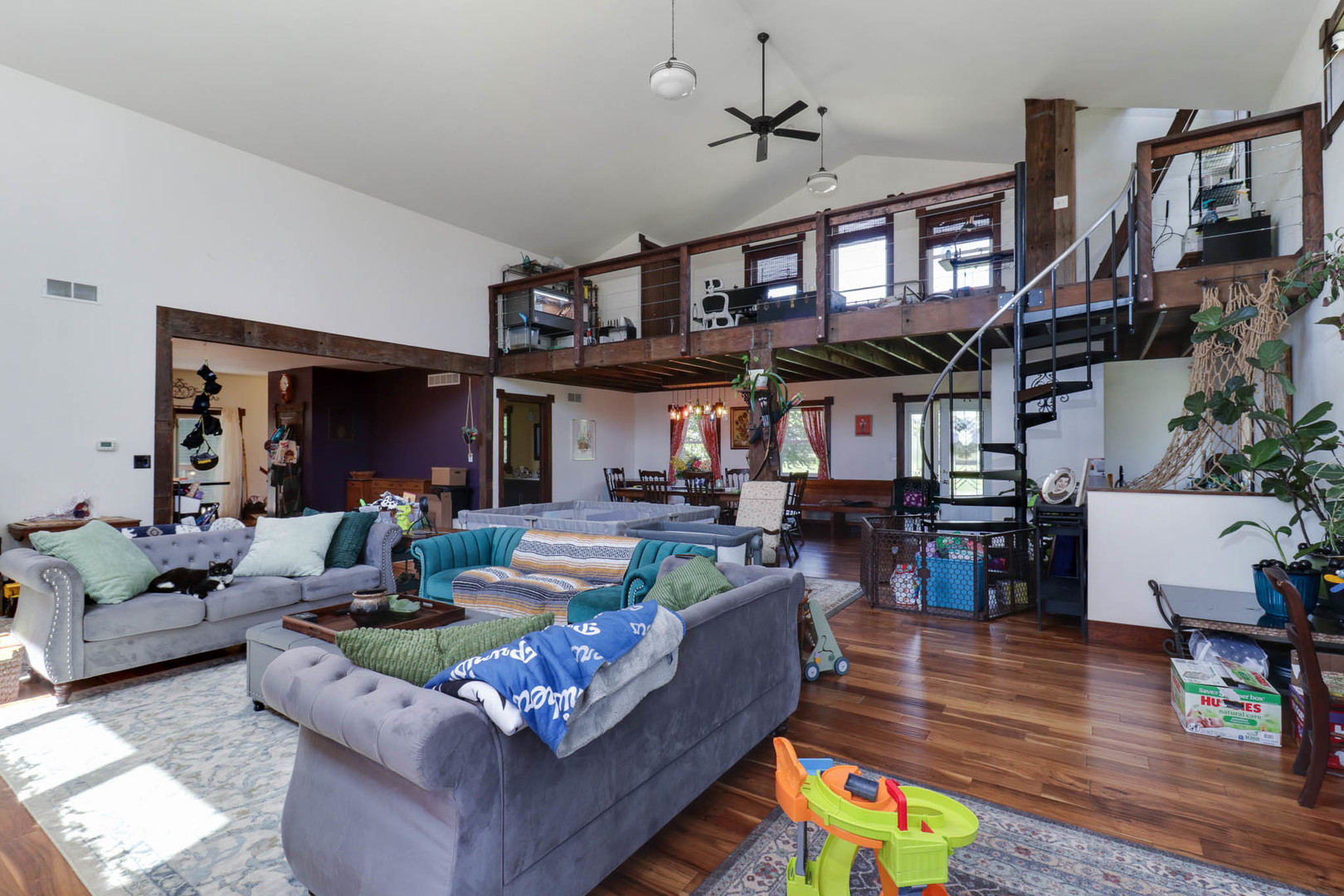 12014 Prairie Center Road Clinton, IL 61727 - Photo 5 of 56 a living room with fireplace furniture and a wooden floor