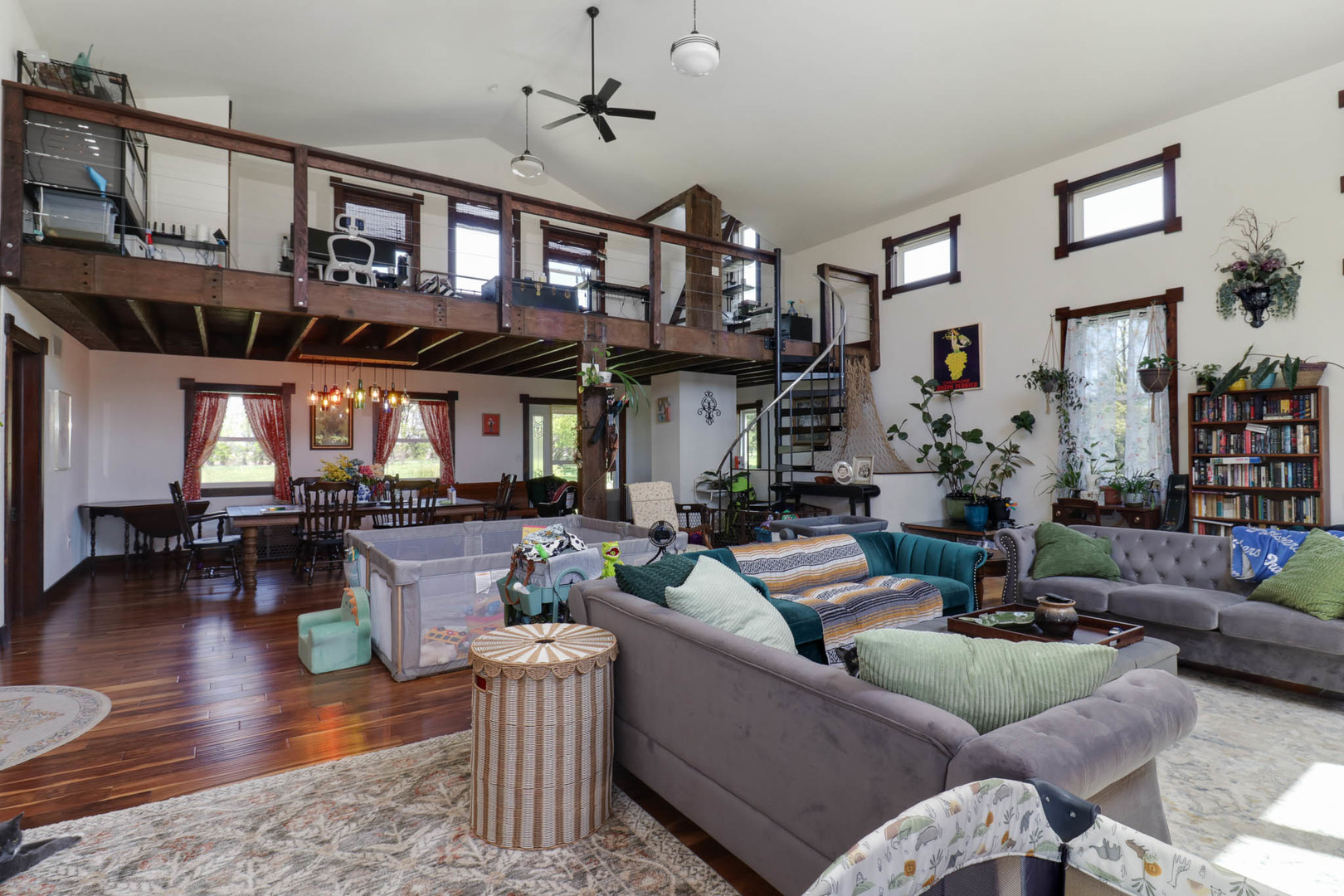 12014 Prairie Center Road Clinton, IL 61727 - Photo 6 of 56 a living room with fireplace furniture and a wooden floor