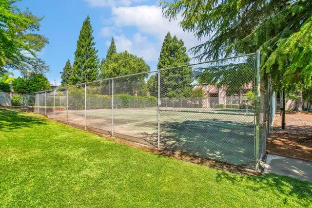a backyard of a house with lots of green space