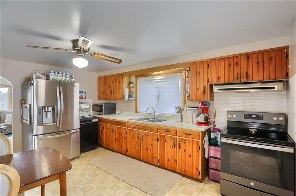 109 Staff Road Slippery Rock, PA 16057 - Photo 7 of 20 a kitchen that has a lot of cabinets a sink and appliances