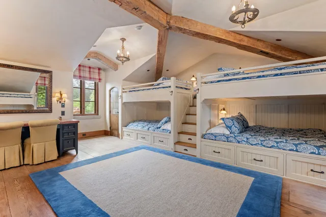 a bathroom with a sink vanity and a mirror