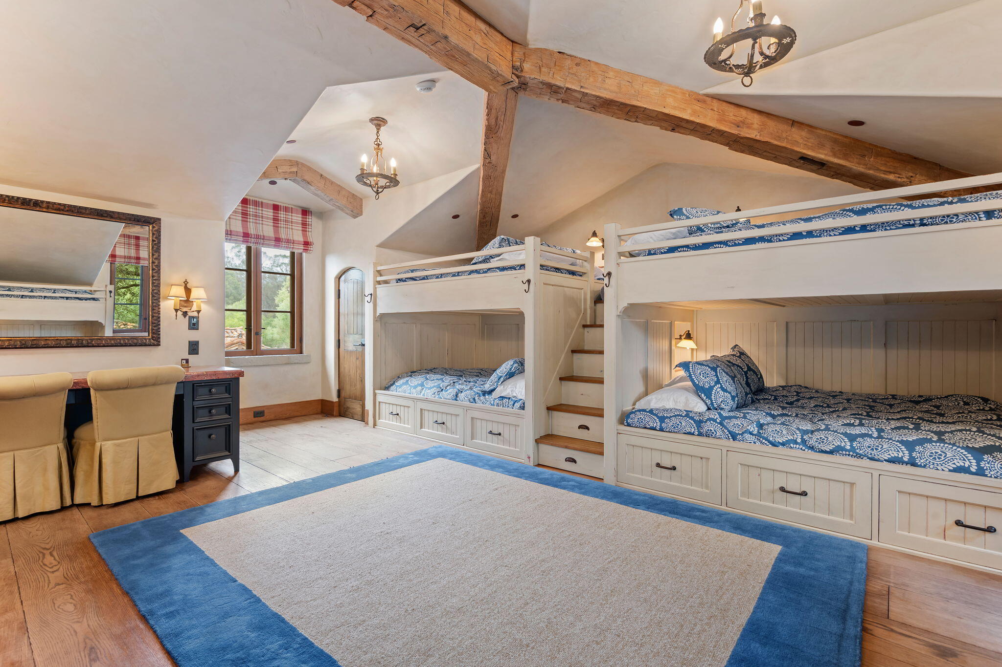 1915 Monte Allegro Drive Carpinteria, CA 93013 - Photo 28 of 59 a living room with furniture and a fireplace