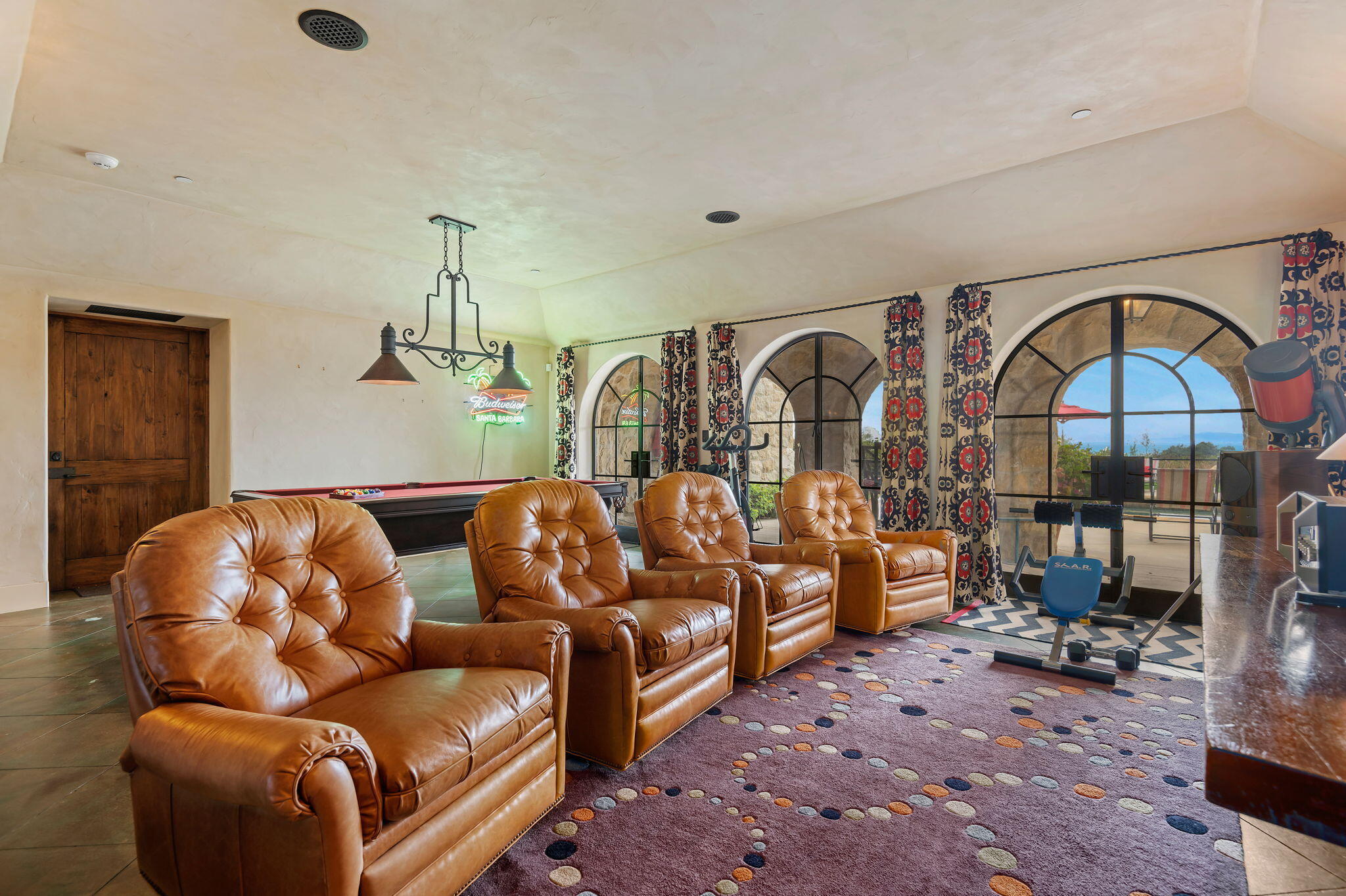 1915 Monte Allegro Drive Carpinteria, CA 93013 - Photo 41 of 59 a living room with furniture a couch and dresser