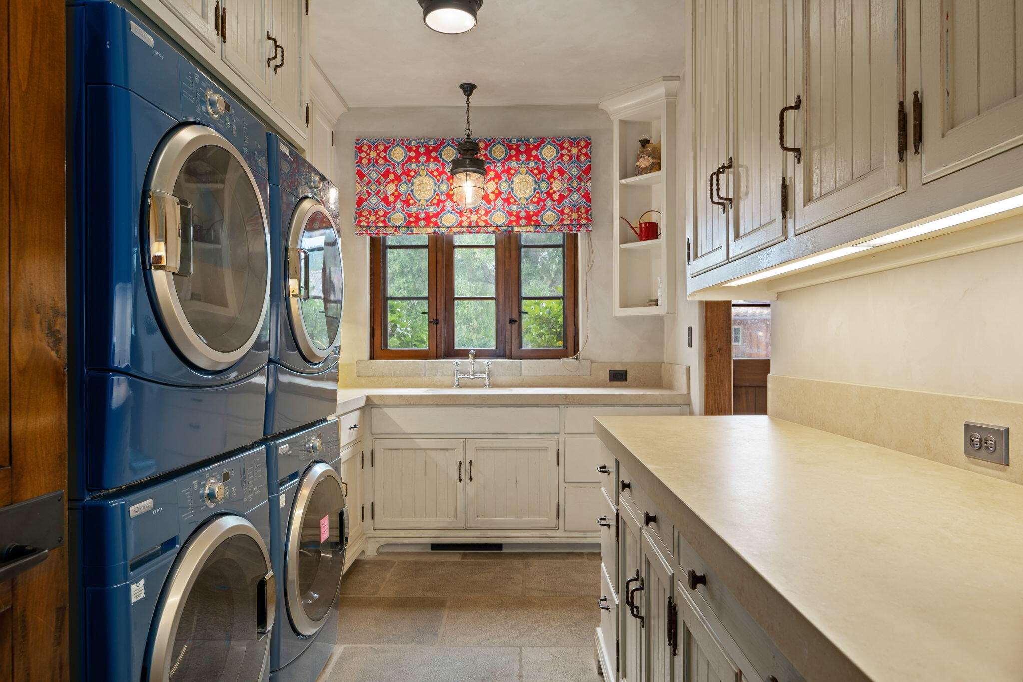 1915 Monte Allegro Drive Carpinteria, CA 93013 - Photo 46 of 59 a view of a bathroom with washing machine and a sink