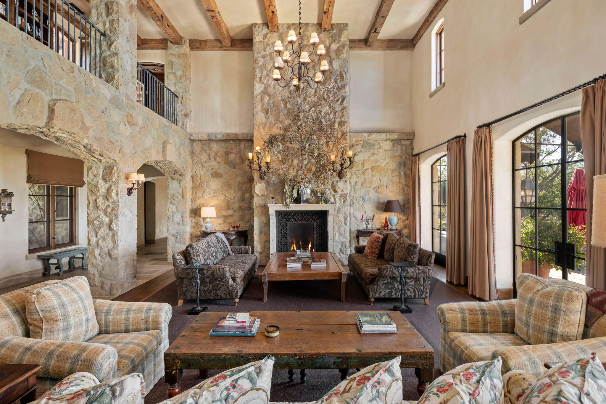 1915 Monte Allegro Drive Carpinteria, CA 93013 - Photo 10 of 59 a living room with furniture and a fireplace