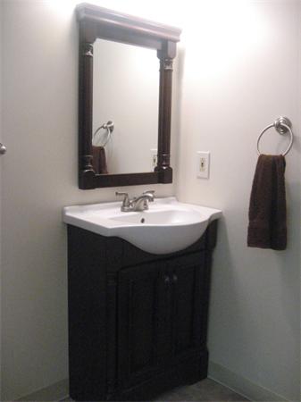 77 Hastings Road Ashburnham, MA 01430 - Photo 15 of 28 a bathroom with a sink vanity and a mirror