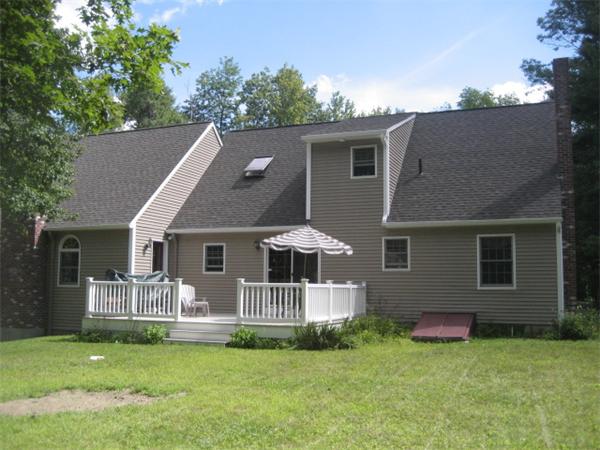 77 Hastings Road Ashburnham, MA 01430 - Photo 19 of 28 front view of a house with a yard