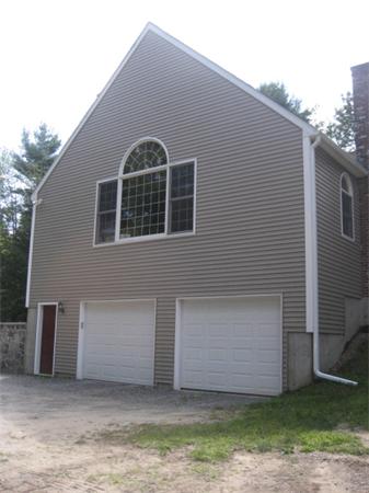77 Hastings Road Ashburnham, MA 01430 - Photo 26 of 28 a front view of a house