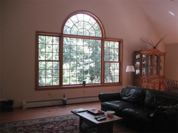 77 Hastings Road Ashburnham, MA 01430 - Photo 3 of 28 a living room with furniture and a large window