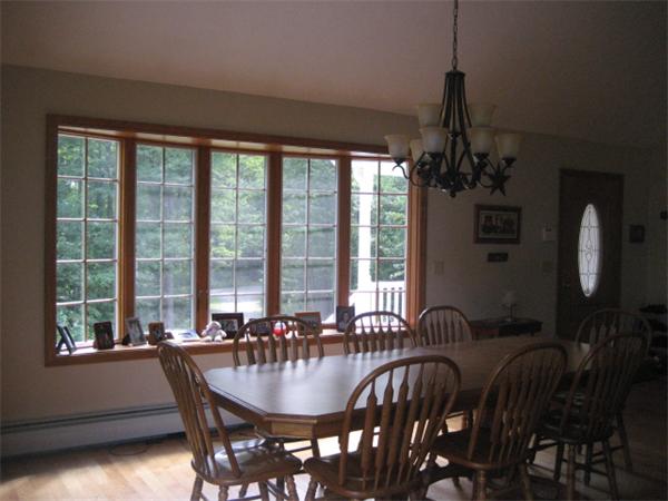 77 Hastings Road Ashburnham, MA 01430 - Photo 4 of 28 a view of a dining room with furniture window and outside view