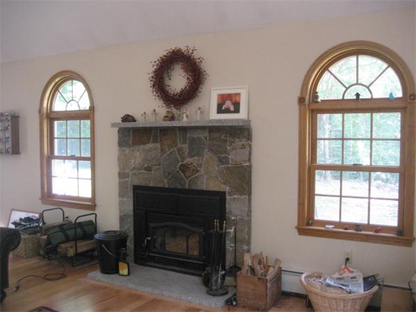 77 Hastings Road Ashburnham, MA 01430 - Photo 7 of 28 a living room with furniture and a fireplace