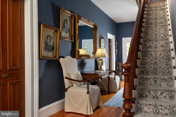 a dining room with furniture and a fireplace