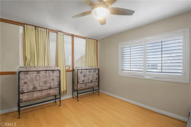 a view of room with window and furniture