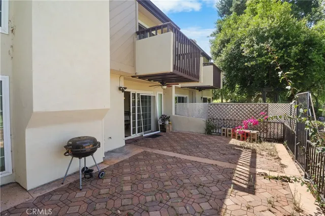 a view of a chairs and tables in the patio