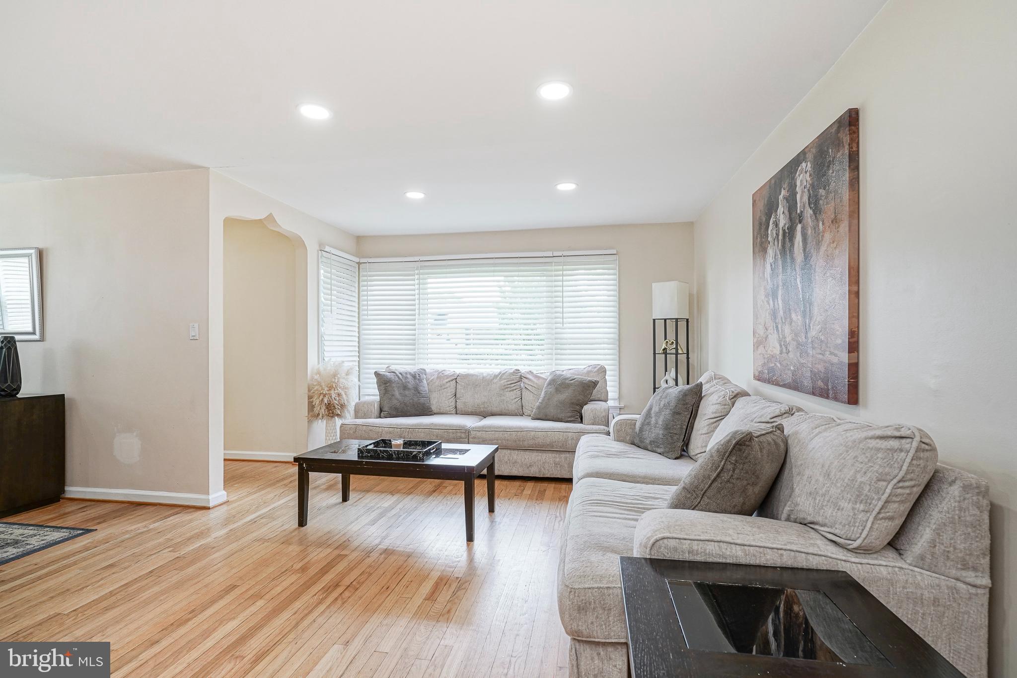 411 Arch Street Delran, NJ 08075 - Photo 4 of 28 a living room with furniture and wooden floor