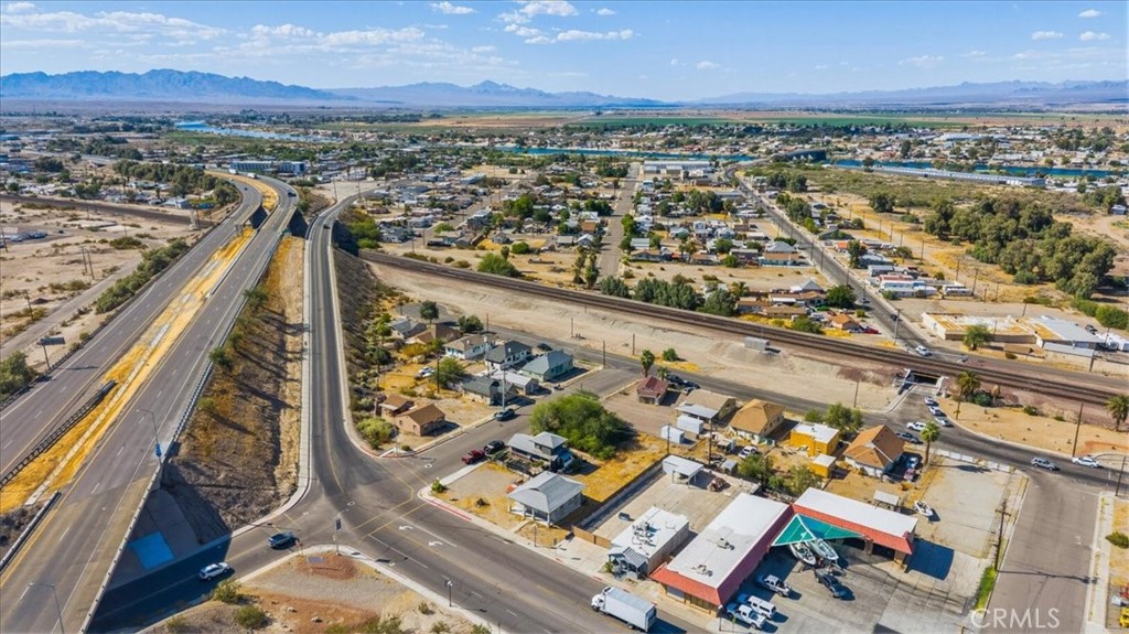 0 South L Street Needles, CA 92363 - Photo 11 of 16 an aerial view of residential houses with outdoor space