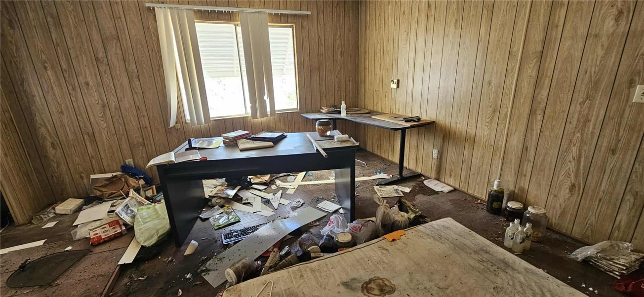 7535 Camp Rock Road Lucerne Valley, CA 92356 - Photo 12 of 62 a view of a room that has a bed and a dresser in it