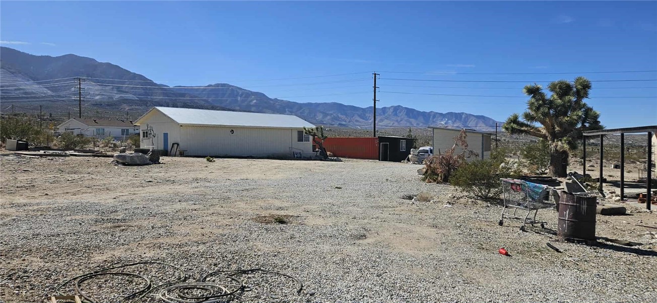 7535 Camp Rock Road Lucerne Valley, CA 92356 - Photo 23 of 62 a view of a house with a yard