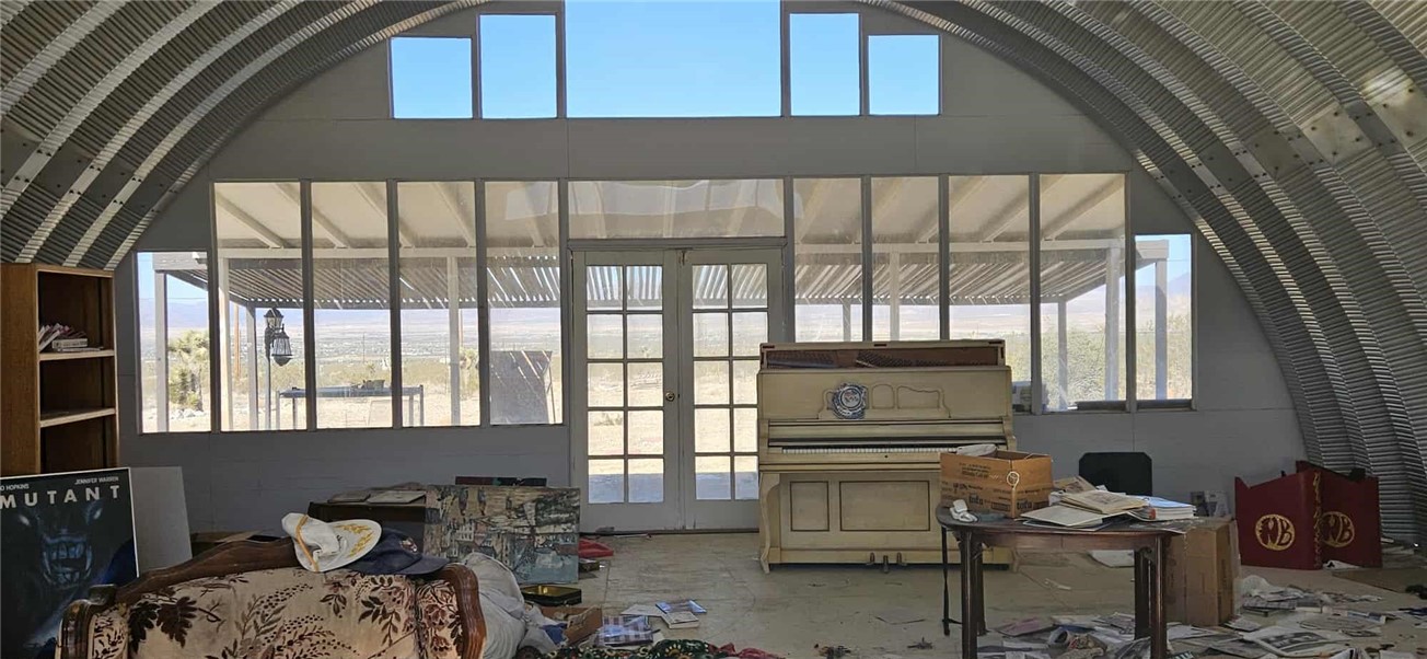 7535 Camp Rock Road Lucerne Valley, CA 92356 - Photo 28 of 62 a bedroom with furniture and a window
