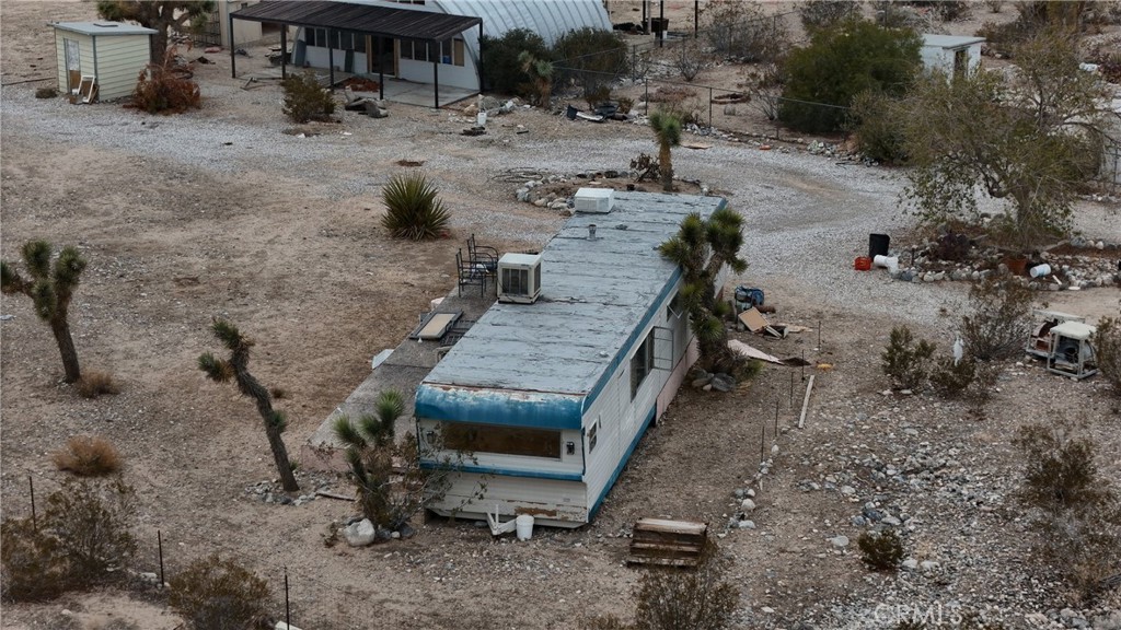 7535 Camp Rock Road Lucerne Valley, CA 92356 - Photo 33 of 62 a view of a backyard with sitting area