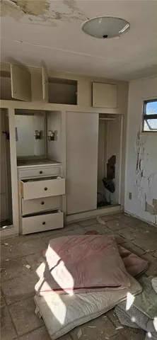 a backyard of a house with wooden fence