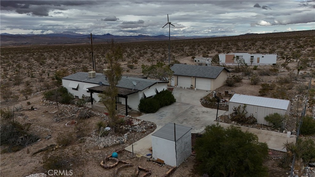 7535 Camp Rock Road Lucerne Valley, CA 92356 - Photo 42 of 62 an aerial view of a house with a yard