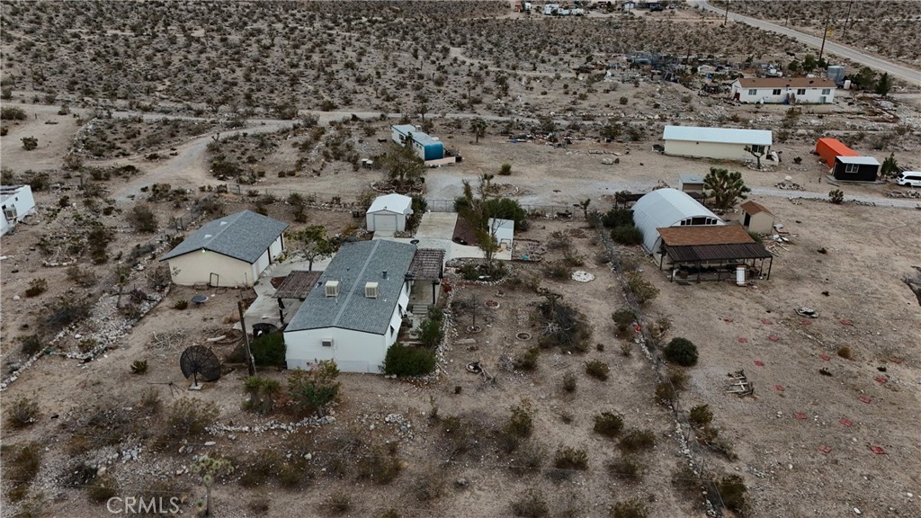 7535 Camp Rock Road Lucerne Valley, CA 92356 - Photo 60 of 62 an aerial view of a house with a yard