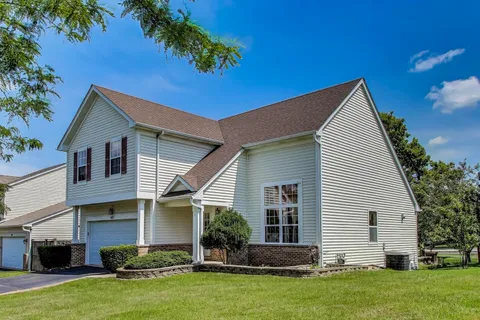 a house view with a garden space