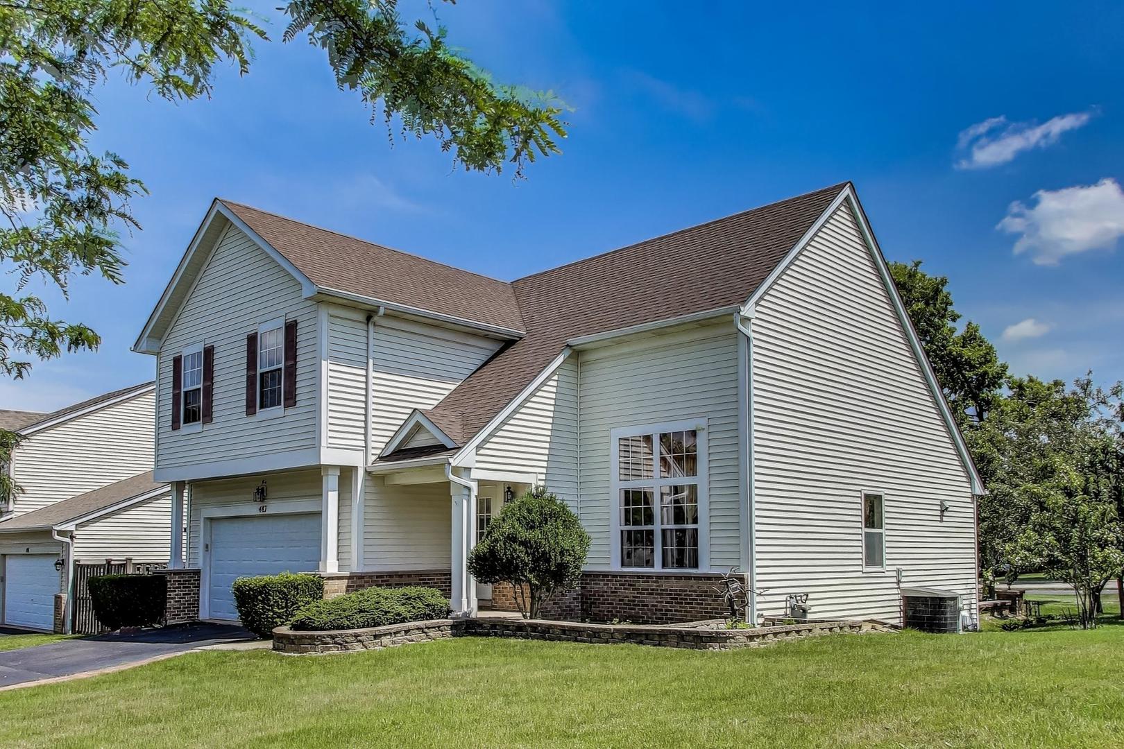 487 Anna Lane Romeoville, IL 60446 - Photo 2 of 38 a house view with a garden space