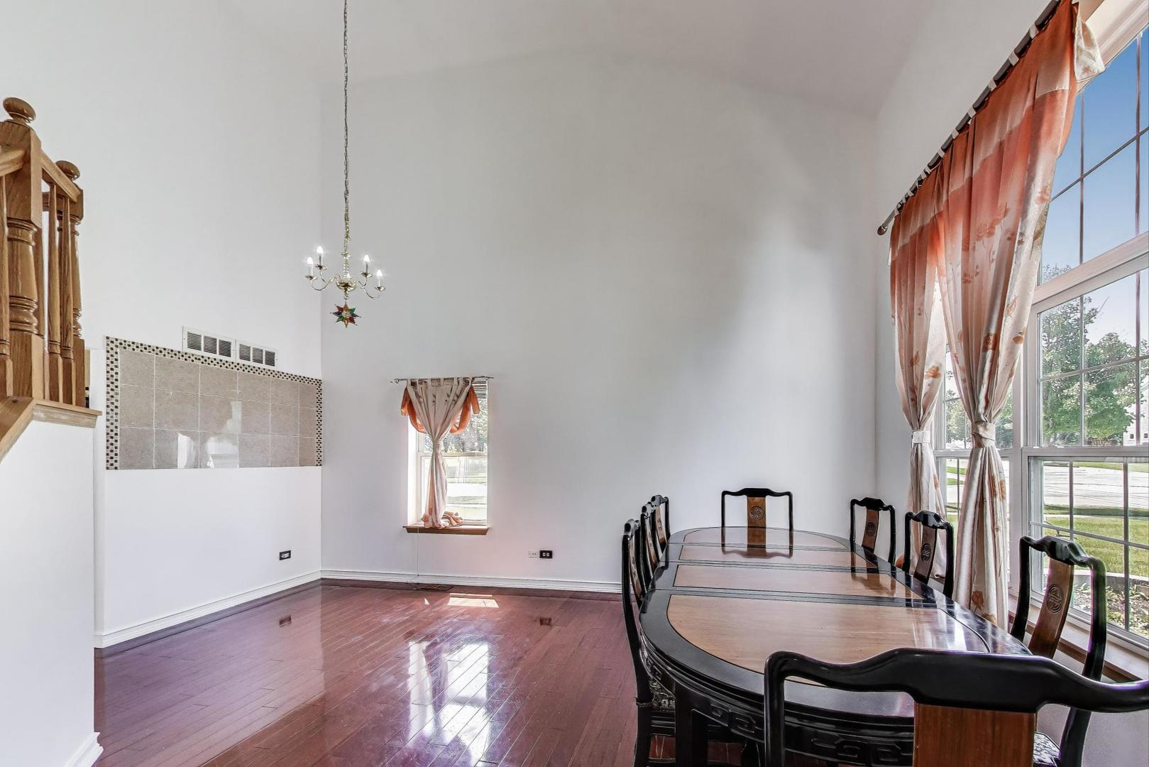 487 Anna Lane Romeoville, IL 60446 - Photo 6 of 38 a view of a dining room with furniture and window