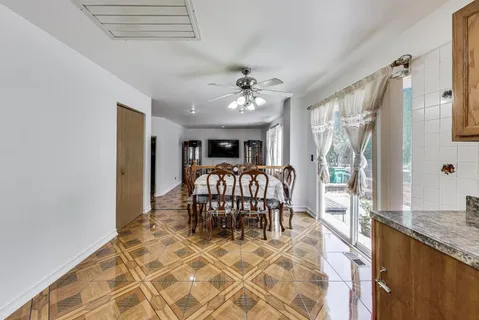 a view of a dining room with furniture